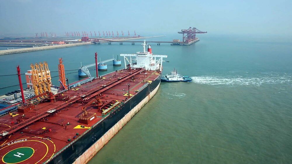 Tanker being loaded in harbour